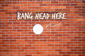 bang-head-against-brick-wall